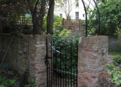 Single gate with lattice arch, Maida Vale, London