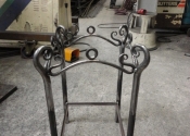 Alan Patterson, making bedside tables at Ironart