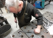 Alan Patterson, making bedside tables at Ironart