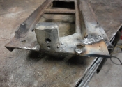 Image shows the top plate for the stove. Addition of new mounting lugs for the flue and a broken corner piece.