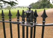 Double gates with cast iron finials at Ashton Court, Bristol
