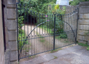 Bailbrook Lane Wrought iron double entrance gates with bun finial detail
