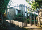 Wrought iron bow topped double gates at Bathford, near Bath