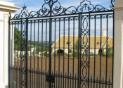 Traditionally made wrought iron double entrance gates at Colerne, Bath