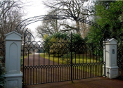 A large set of double gothic gates with an overthrow, Romsey, Hampshire