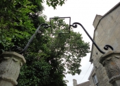 Reinstalling the gates at St Mary Tory chapel, Bradford on Avon, Wilts