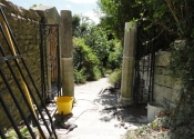 Reinstalling the gates at St Mary Tory chapel, Bradford on Avon, Wilts