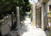 Reinstalling the gates at St Mary Tory chapel, Bradford on Avon, Wilts