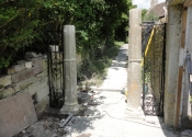 Reinstalling the gates at St Mary Tory chapel, Bradford on Avon, Wilts