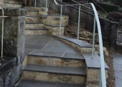 Curving exterior handrail in Lichen paint finish on St Saviours Road, Larkhall, Bath