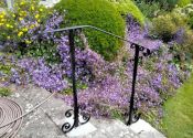 Scrollwork detail handrails in Upton Cheyney 