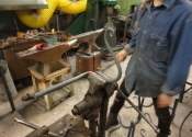 Bending bars to create the bases for each cake stand