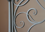 Detail from the contemporary wrought iron scrollwork balustrade on Lansdown, Bath