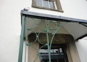 Restoration of an historic iron porch with lead cast detail - Westcombe, Somerset