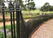 Wrought iron railings with cast spear finials at Ashton Court in Bristol, by Ironart of Bath
