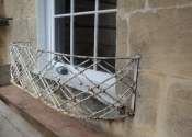 Restoration of historic wrought iron balconettes with lead cast detailing - Ironart of Bath