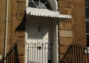 Restored and refitted - door canopy on Cavendish Crescent, Bath