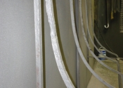 Stripped wrought iron door canopy frame.