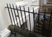 Gate and railings on Rivers Street Bath, prior to restoration