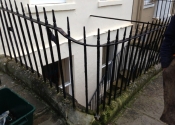 Gate and railings on Rivers Street Bath, prior to restoration