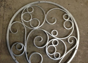 Decorative metal well cover by Ironart of Bath