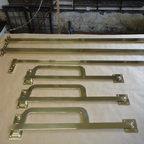Brass bespoke shutter bars by Ironart of Bath