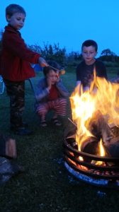 Boys around the brazier